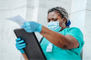 impact of cleaning chemicals on cellular health 3 A nurse checking a chart, The true dangers of traditional cleaners
