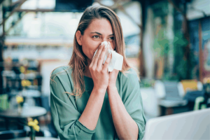 a women suffering from allergies