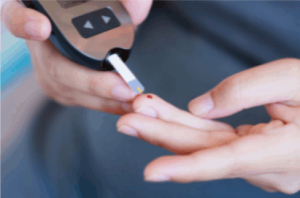 pricking a finger to check blood sugar for diabetes